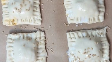 Golden puff pastry bites stuffed with Schezwan chicken and cheese filling